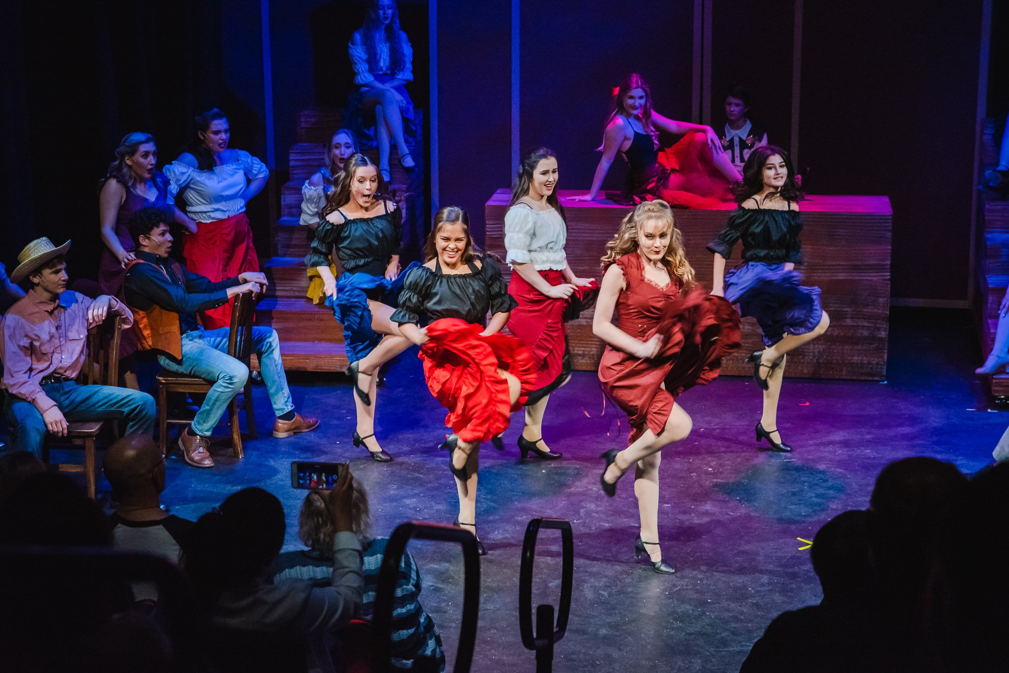 Tampa Prep theater students dane on stage during a performance of Curtains