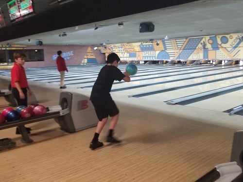 Middle School student bowling